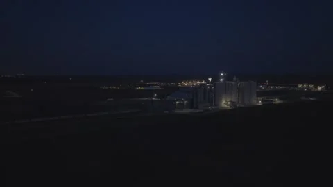 Orbiting Aerial Night View of Illuminated Soybean Processing Plant on Dakota Stock Footage 337615607