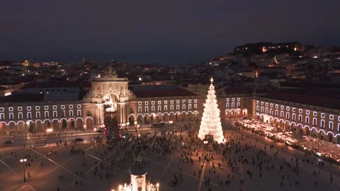 Orbiting aerial shot of Praca do Comercio Christmas Tree in Lisbon at Night Stock Footage 323033856