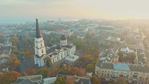 Orbiting aerial shot of Transfiguration Cathedral and Odessa city center Stock Footage 107809333
