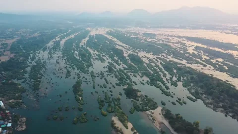 Orbiting aerial view of islets in Don Det, Laos. Cinematic drone shot at sunset 스톡 동영상 248214508