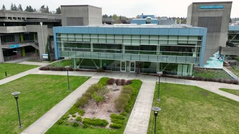 Orbiting aerial view of North Seattle College's Opportunity Center Stock-Footage 239505004