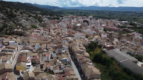Orbiting around the town of Onil, with the Mariola mountain range behind. Spain. Stock-Footage 336644445