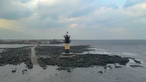 Orbiting Camera View of Udo Island from a Lighthouse, Udo-biyangdo, Jeju. Stock Footage 146067162