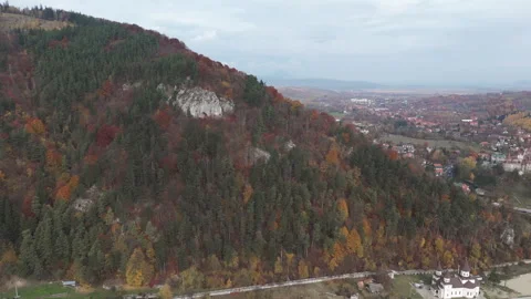 Orbiting Carpathian Mountains over Bran, Romania Stock Footage 290443710