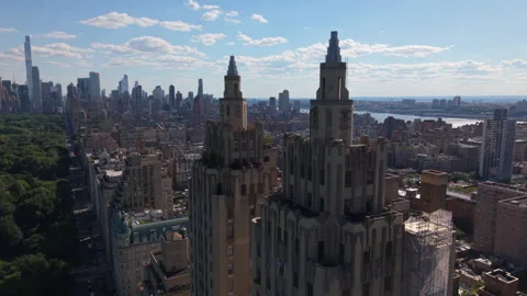 Orbiting counter clockwise around iconic towers on Central Park West in NYC Vídeo Stock 337613640