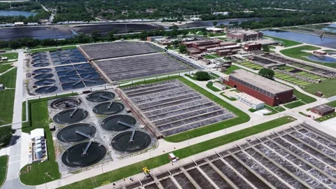 Orbiting drone shot above a large water reclamation facility revealing Stock Footage 338102898