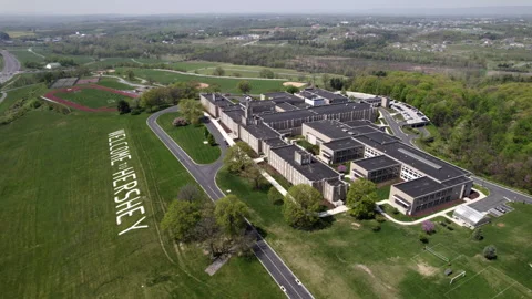Orbiting drone shot of Catherine Hall at the Milton Hershey School in Stock Footage 277682458