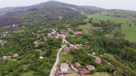 Orbiting drone shot of the mountains and fields of Tsarichina Hole Stock Footage 265987620