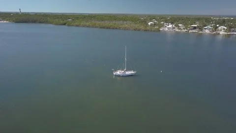 Orbiting Drone Shot of a Sailboat in the Bay of Key Largo 4K Video stock 84274091