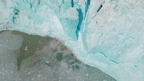Orbiting Drone Video of a Glacier About to Calve in Alaska 4K Stock Footage 281907229