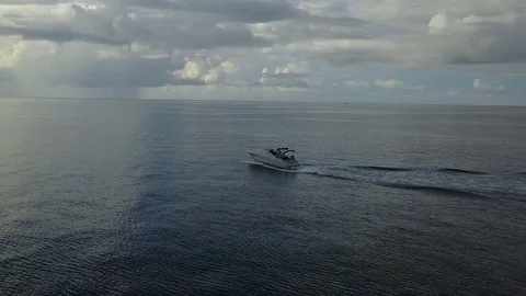 Orbiting A Fast Moving Boat Across The Florida Keys' Ocean Video stock 79447179
