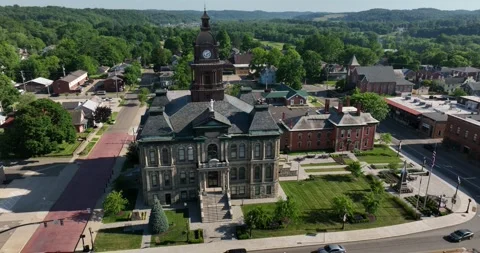 Orbiting flight viewing an old restored courthouse building Stock-Footage 335672249
