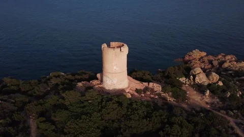 Orbiting a Genoese tower at sunset in 4K Stock Footage 102715906