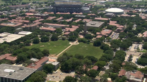 Orbiting LSU campus in Baton Rouge with bell tower in center frame. Shot in Stock Footage 59506997