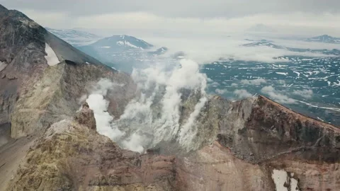 Orbiting over the Ridge of Active Crater of Mutnovsky Volcano, Kamchatka Stock Footage 167113407