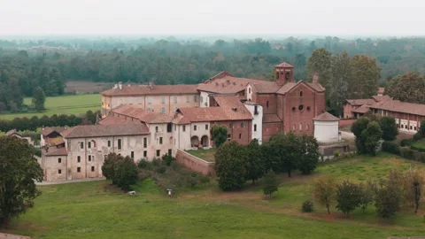 Orbiting right close up movement Abbazia Morimondo top shot in the Stock Footage 253770312