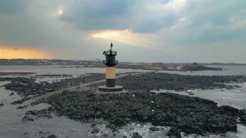 Orbiting Seashore View of Udo-biyangdo Close from a Lighthouse, Udo, Jeju. Stock Footage 146067167