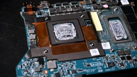 Orbiting Shot of a Graphics Processor with Thermal Paste Stock Footage 313860971