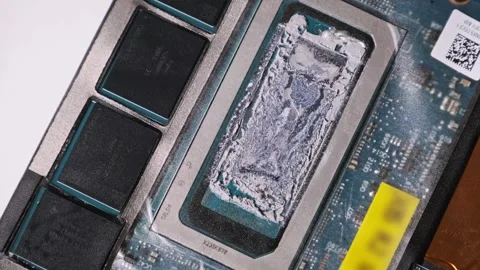 Orbiting Shot of a Processor with Gallium-Based Thermal Paste Stock Footage 314076404