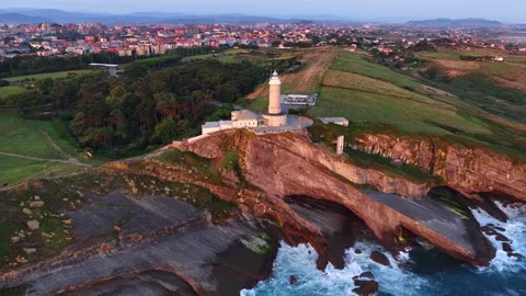 Orbiting shot of Santander lighthouse in Cantabria, Santander is a city on the Stock Footage 316686332