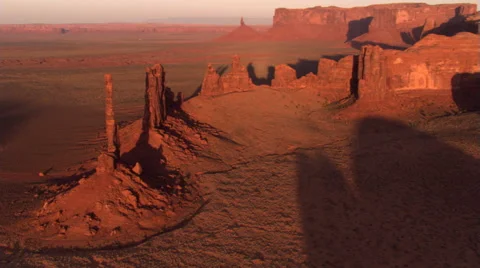 Orbiting Totem Pole Rock in Monument Valley, with lens flares Stock Footage 59526060