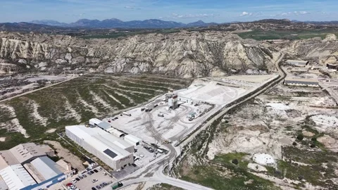Orbiting View of Branded Plaster Factory in Arid Hills 스톡 동영상 333942426