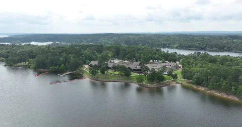 Orbiting view of the resort and lakefront Stock Footage 250582754