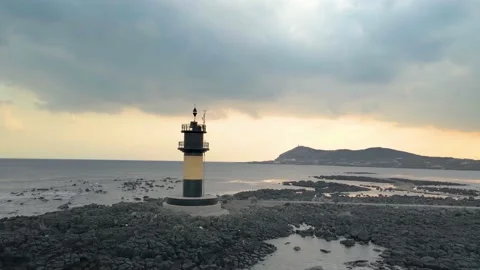 Orbiting View of Soemeori Oreum from a Lighthouse, Udo-biyangdo, Udo. Stock Footage 146067151