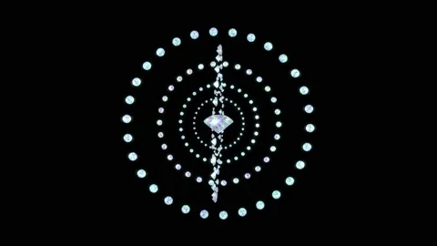 Orbits from crystal gems moving around the core Stock Footage 154712003
