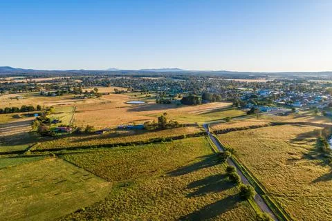 Orbost township and fields at sunset - aerial view in Victoria, Australia Stock Photos