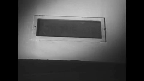 An orchestra and a singer perform on the Fred Waring Show at the NBC radio Stock Footage 88958900