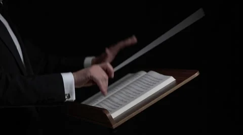 Orchestra Conductor Directing With His Baton Stock Footage 61020200