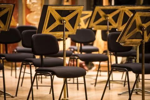 Orchestra empty seats on a stage Stock Photos
