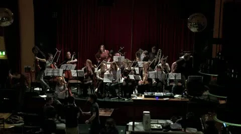 Orchestra leaves stage timelapse Stock Footage 10871636