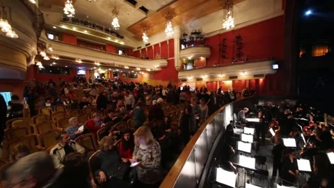Orchestra pit and auditorium with spectators in Stock Footage 299649120