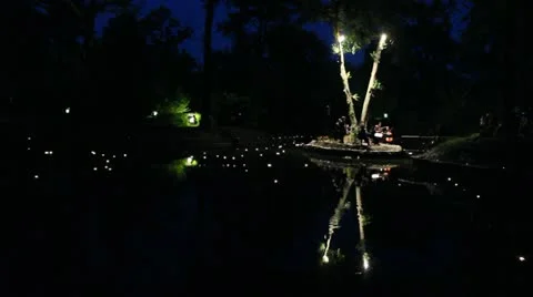 Orchestra playing classic music on a lake Stock Footage