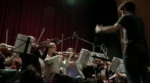 Orchestra playing to conductor Stock-Footage 10871844