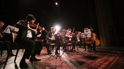 The orchestra plays on stage Stock Footage 45174328