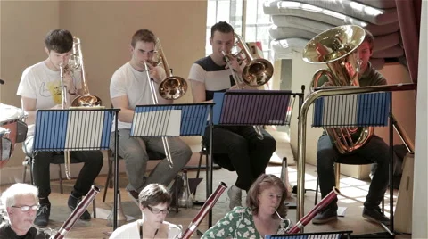 Orchestra rehearsal: trombones and tuba Stock Footage