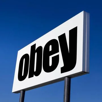Order to OBEY Horizontal billboard with the order to OBEY, against irreal ... Stock Photos