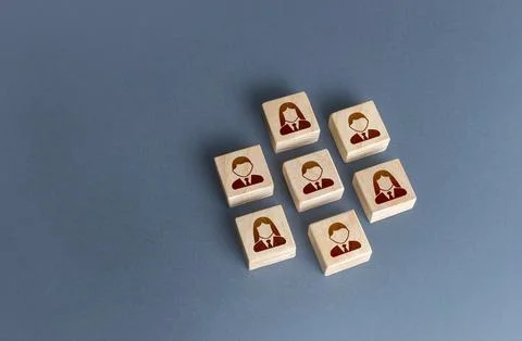 An ordered set of people on blocks. Combining to achieve a goal. Unity. Tea.. Stock Photos