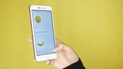 Ordering online with your smartphone, ordering in online shop of food. Isolated Video stock 130817756