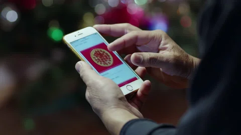 Ordering pizza by phone close up Stock Footage 147050870