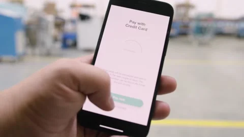 Ordering something on a phone in a warehouse Stock Footage 143463556