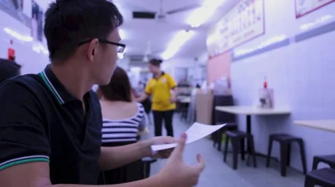 Ordering at Swee Choon Restaurant in Singapore Stock Footage 65322344
