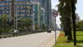 Ordinary life in Batumi, vehicles moving down street, travel to sunny Georgia HD Footage