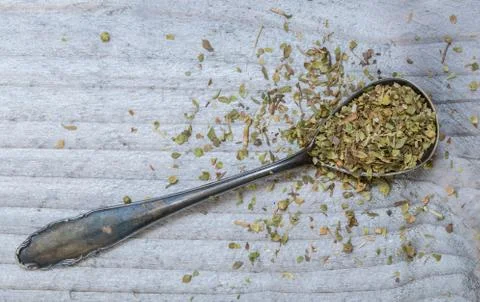 Oregano on a spoon macro Stock Photos