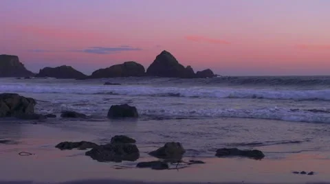 Oregon Coast Breakers and Sunset Rocks Evening Stock Footage 22409636