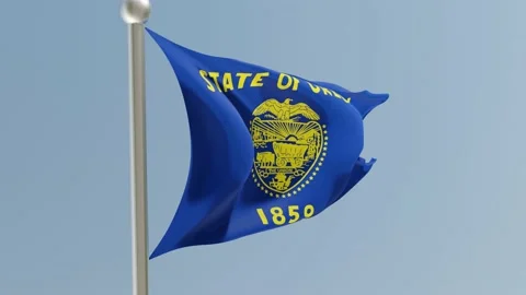 Oregon flag on flagpole. OR flag fluttering in the wind. USA. Stock Footage 170570266