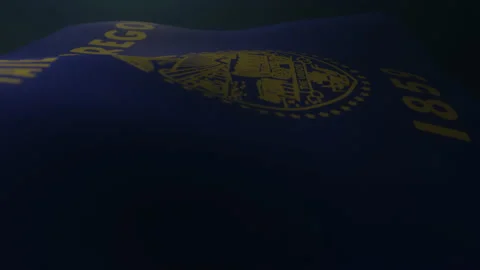 Oregon Flag waving in a dark atmospheric environment in slow motion. Infinite Stock Footage 132811702